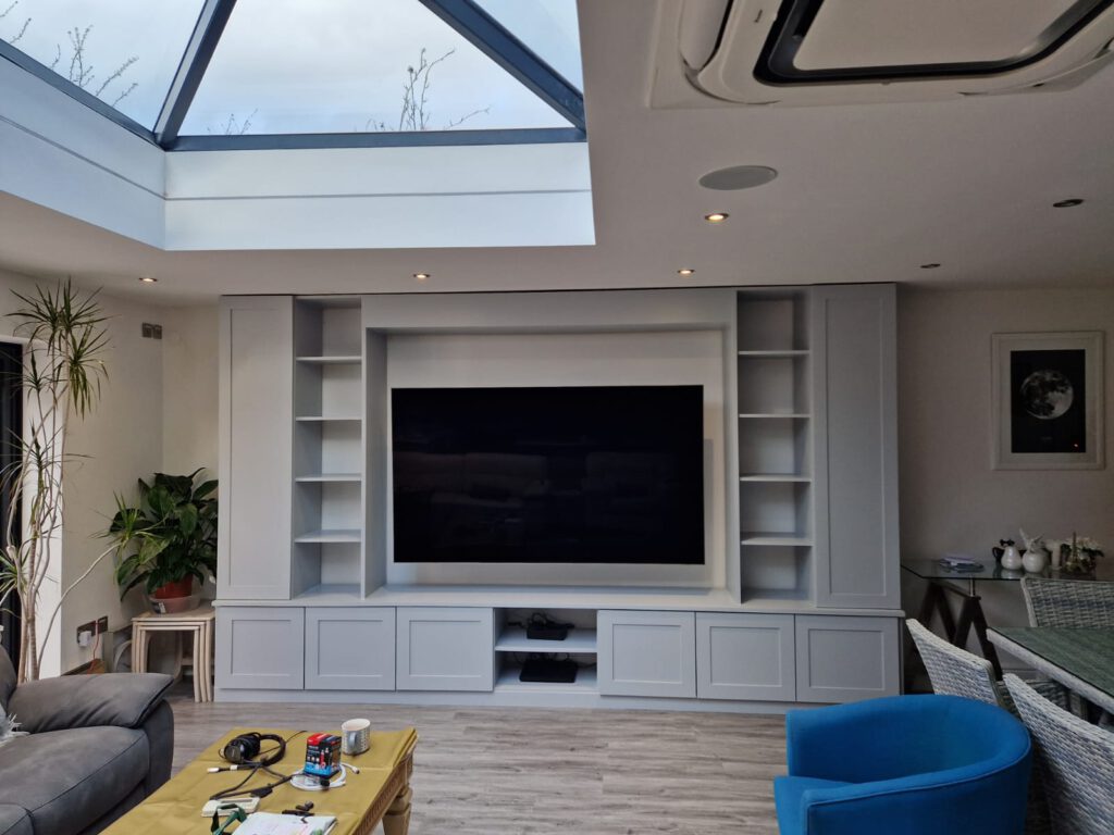 Fireplace style media wall installation in London